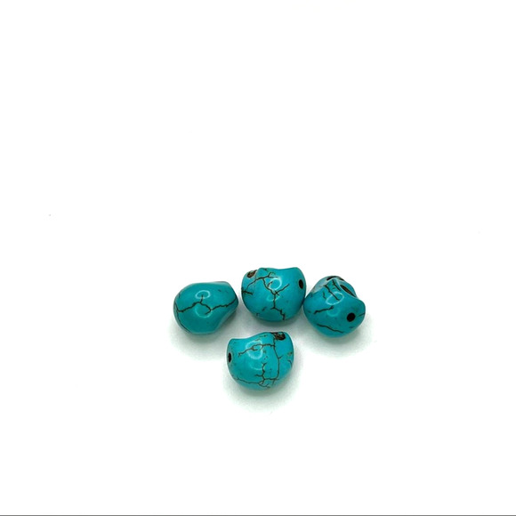 Turquoise hand carved skull beads - Picture 4 of 7